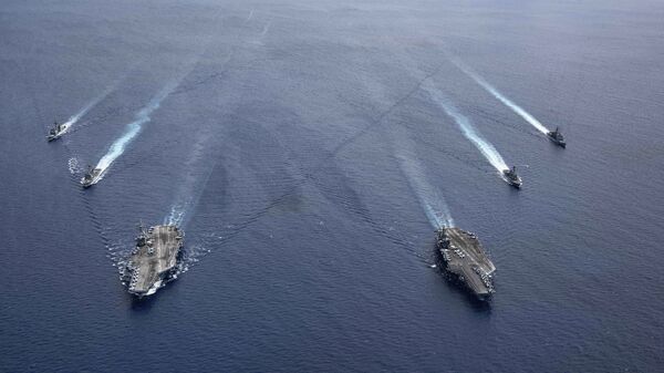 Embarcações da Marinha dos EUA, o USS Ronald Reagan e o USS Nimitz entram em formação no mar do Sul da China - Sputnik Brasil