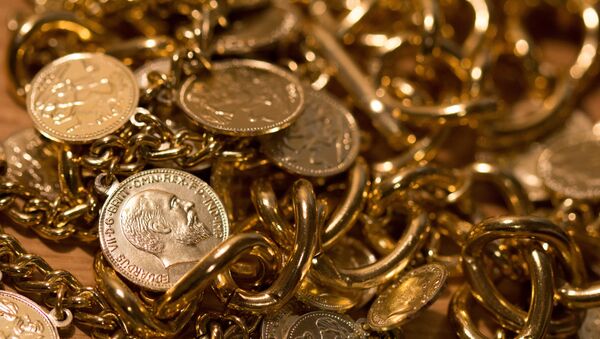 Foto de moedas de ouro - Sputnik Brasil