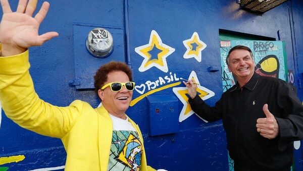 Presidente do Brasil, Jair Bolsonaro, visita estúdio do artista plástico, Romero Britto, em Miami, EUA, 9 de março de 2020 - Sputnik Brasil
