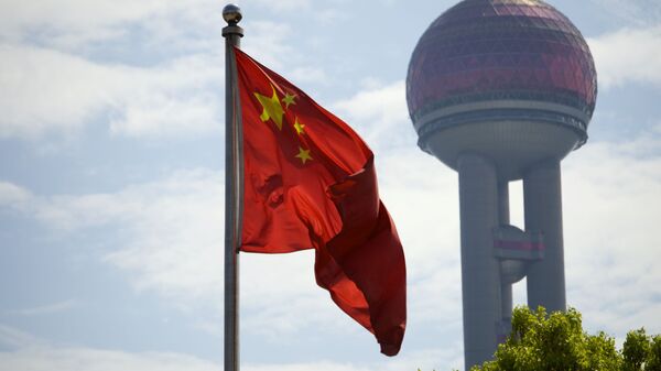 Bandeira da China em Xangai, distrito financeiro - Sputnik Brasil