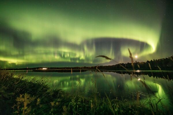 Aurora boreal no céu sobre Rovaniemi, Finlândia
 - Sputnik Brasil