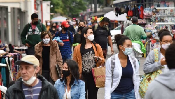 Pedestres usam máscaras na Avenida Paulista, São Paulo, 23 de setembro de 2020  - Sputnik Brasil
