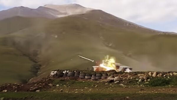  Disparo de artilha na região contestada de Nagorno-Karabakh (foto de arquivo) - Sputnik Brasil