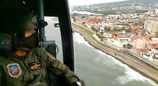 Patrulhas aéreas são realizadas em praias para evitar a entrada de banhistas na Colômbia.  - Sputnik Brasil
