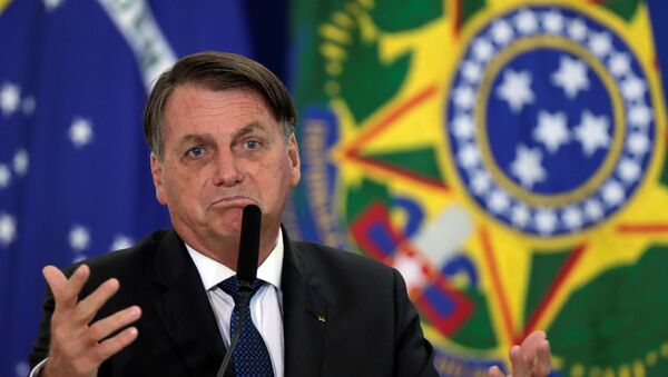 Presidente Jair Bolsonaro durante posse do novo ministro do Turismo, Gilson Machado, no Palácio do Planalto - Sputnik Brasil