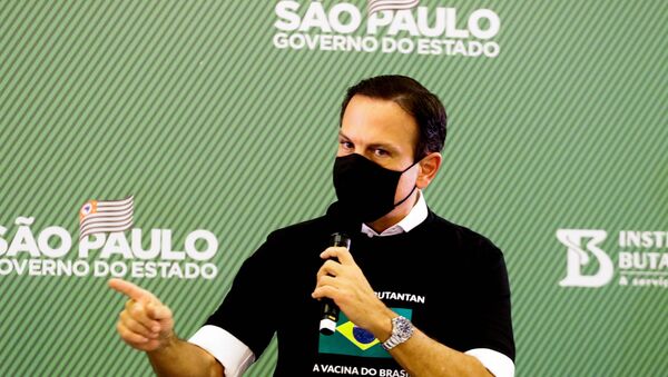 João Doria, governador de São Paulo, participa de entrevista coletiva após a aplicação da primeira vacina contra a COVID-19 na capital paulista - Sputnik Brasil