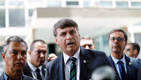 Presidente Jair Bolsonaro conversa com jornalistas após encontro com ministro da Economia, Paulo Guedes - Sputnik Brasil