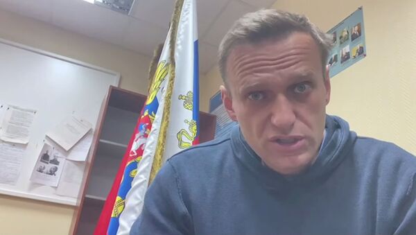 FILE PHOTO: Russian opposition leader Alexei Navalny speaks as he waits for a court hearing in a police station in Khimki outside Moscow, Russia January 18, 2021, in this still image from video obtained from social media. - Sputnik Brasil