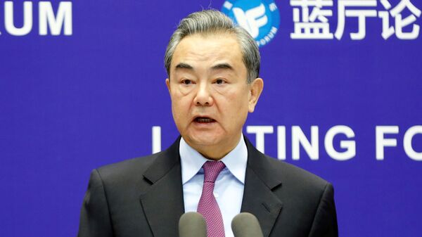 Ministro das Relações Exteriores da China, Wang Yi, discursa em Pequim, China, 22 de fevereiro de 2021      - Sputnik Brasil