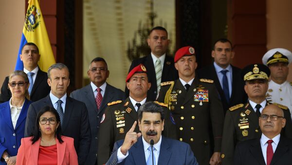 Presidente da Venezuela, Nicolás Maduro, e funcionários do governo em coletiva de imprensa no Palácio Miraflores - Sputnik Brasil