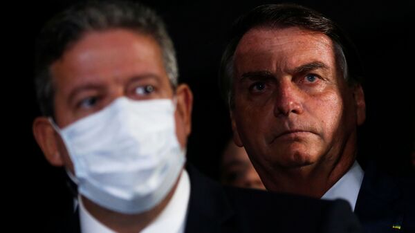 Presidente do Brasil, Jair Bolsonaro (à direita) e o presidente da Câmara, Arthur Lira (PP-AL), durante conferência de imprensa no Congresso Nacional, Brasília, 23 de fevereiro de 2021  - Sputnik Brasil