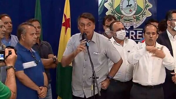 Em Rio Branco (AC), Jair Bolsonaro se irrita e encerra coletiva ao ser perguntado sobre investigação de Flávio Bolsonaro no caso das rachadinhas - Sputnik Brasil