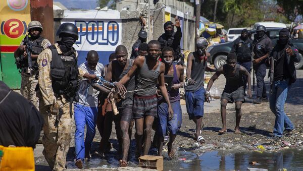 Presos são recapturados pelas forças de segurança após rebelião em presídio no Haiti - Sputnik Brasil