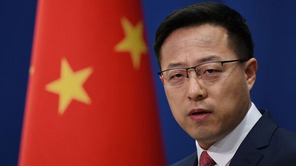 Zhao Lijian, porta-voz do Ministério das Relações Exteriores da China, fala em briefing em Pequim, China, 8 de abril de 2020 - Sputnik Brasil