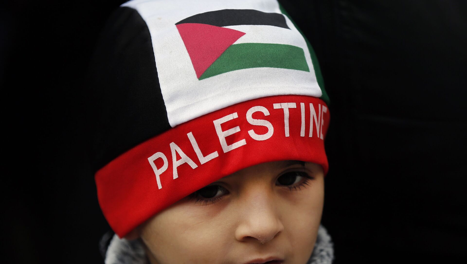 Um menino palestino com um chapéu da bandeira da Palestina - Sputnik Brasil, 1920, 18.03.2021