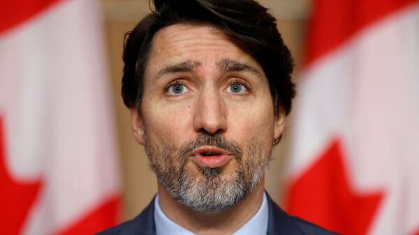 O primeiro-ministro do Canadá, Justin Trudeau, durante coletiva de imprensa em Ottawa, no dia 21 de março de 2021. - Sputnik Brasil