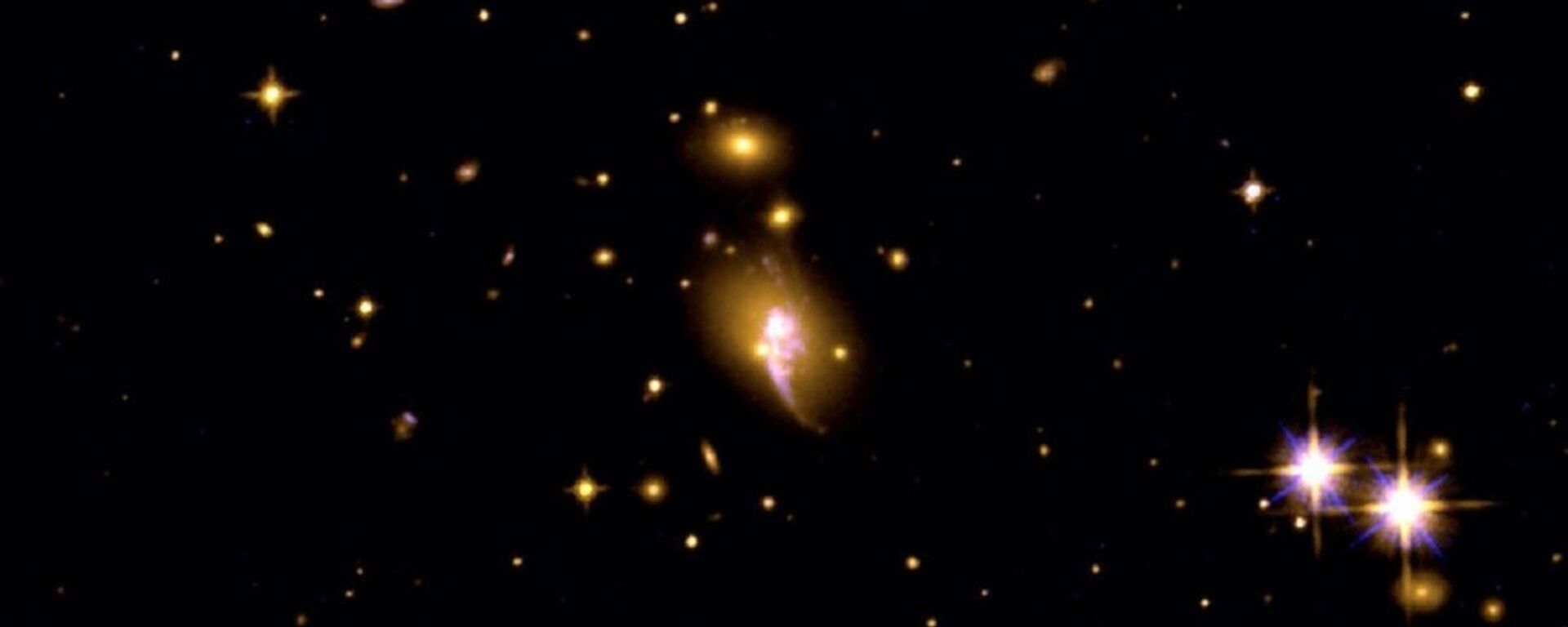 Aglomerado de galáxias CHIPS1911+4455 - Sputnik Brasil, 1920, 08.05.2023
