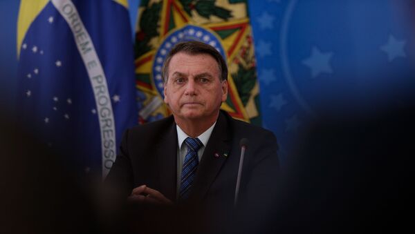 O presidente Jair Bolsonaro durante evento no Palácio do Planalto no dia 5 de fevereiro de 2021 - Sputnik Brasil