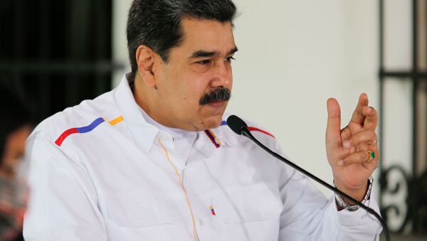 Nicolás Maduro, presidente da Venezuela, gesticula durante discurso em Caracas, Venezuela, 28 de março de 2021 - Sputnik Brasil