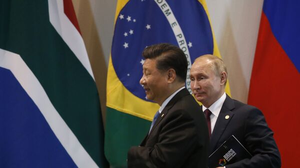 Presidentes da China, Xi Jinping (à esquerda), e da Rússia, Vladimir Putin, durante encontro do BRICS no Itamaraty. Brasília, Brasil, 14 de novembro de 2019 (foto de arquivo) - Sputnik Brasil
