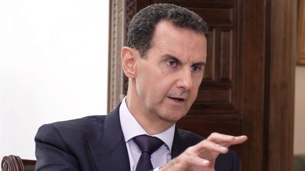 Em Damasco, o presidente da Síria, Bashar al-Assad, fala durante entrevista à Sputnik, em 6 de outubro de 2020 - Sputnik Brasil