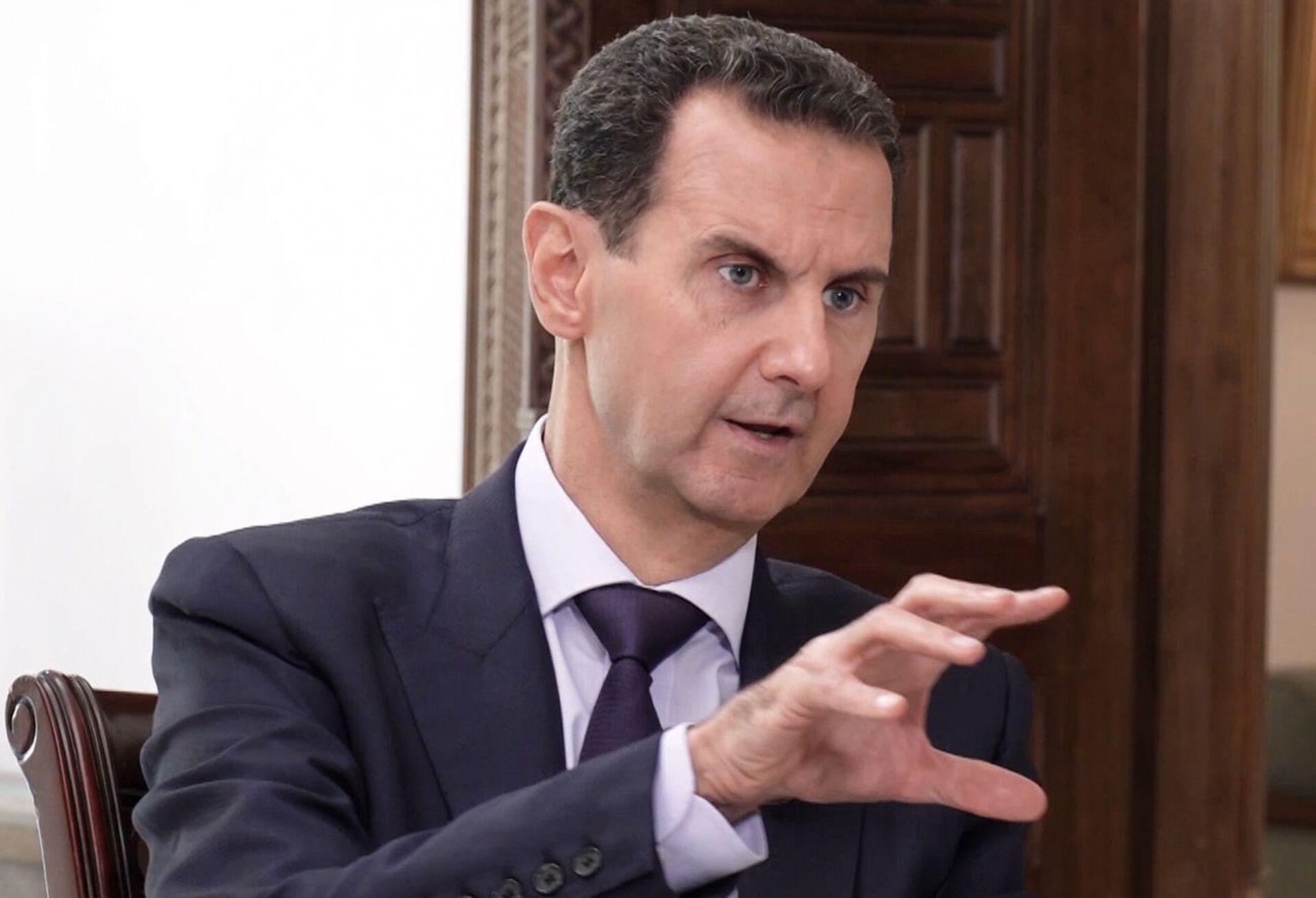 Em Damasco, o presidente da Síria, Bashar al-Assad, fala durante entrevista à Sputnik, em 6 de outubro de 2020 - Sputnik Brasil, 1920, 27.11.2022
