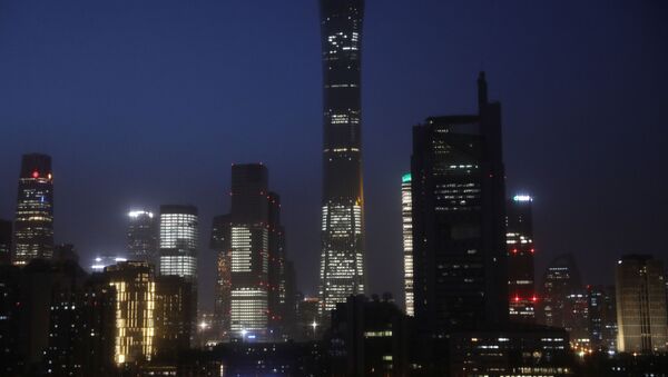Buildings in the Central Business District (CBD) are seen lit up during the night in Beijing, China April 15, 2021. - Sputnik Brasil