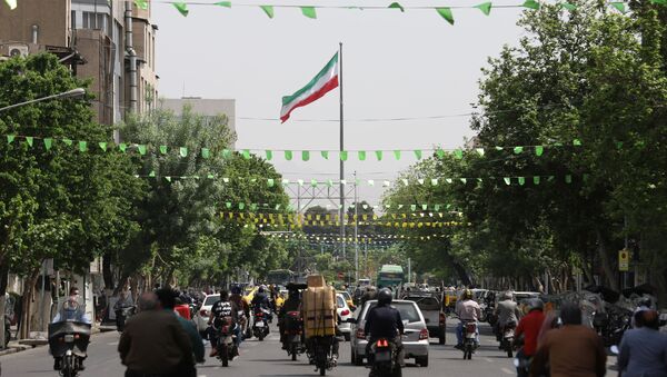 A general view of a street in Tehran following the tightening of restrictions to curb the surge of COVID-19 cases, Iran April 10, 2021. - Sputnik Brasil