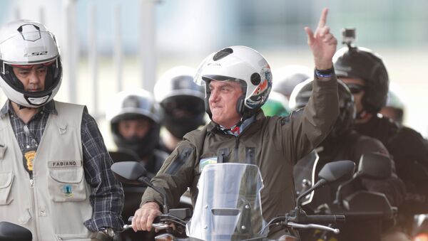 Presidente do Brasil, Jair Bolsonaro, em passeio de moto em prol do Dia das Mães, em Brasília, 9 de maio de 2021 - Sputnik Brasil