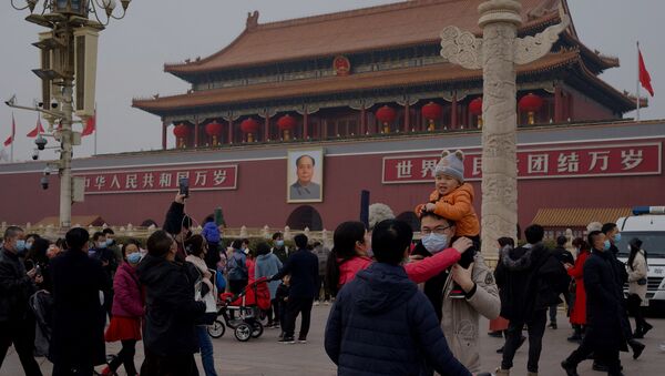 Pessoas na Praça da Paz Celestial, em Pequim, no dia 12 de fevereiro de 2021, durante as comemorações do Ano Novo chinês - Sputnik Brasil
