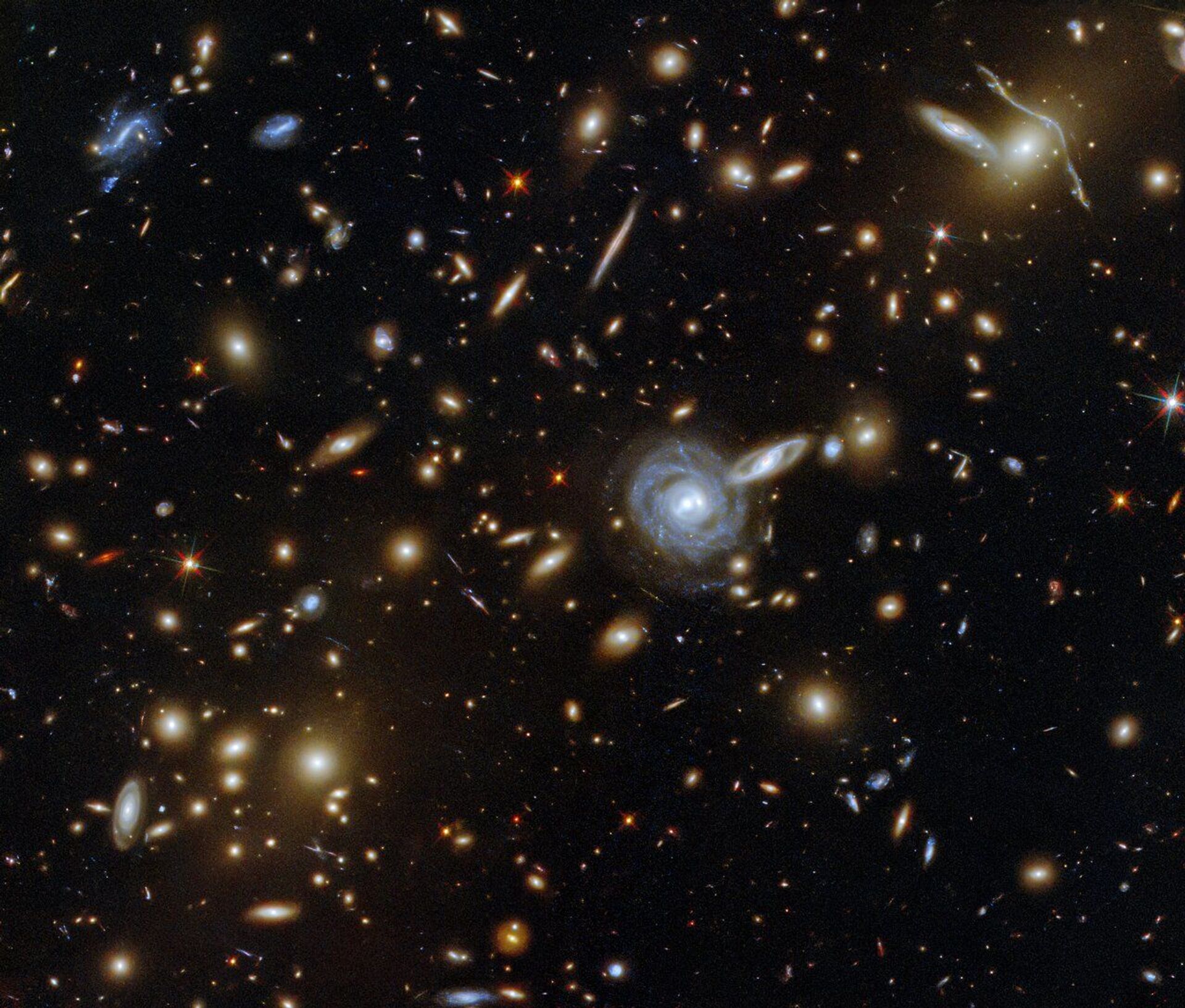 Telescópio Hubble capta aglomerado massivo de galáxias a mais de 3 bilhões de anos-luz (FOTO) - Sputnik Brasil, 1920, 18.05.2021