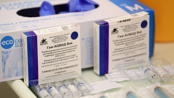 Vacina Sputnik V contra COVID-19 em gabinete de vacinação no shopping Tsum em Moscou, Rússia - Sputnik Brasil