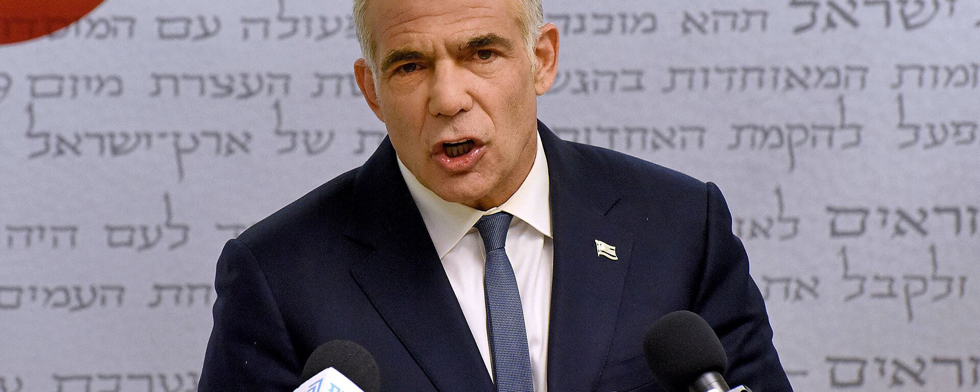 Yair Lapid, líder centrista da oposição de Israel, faz declaração à imprensa no Knesset, Parlamento israelense, em Jerusalém, 31 de maio de 2021 - Sputnik Brasil, 1920, 27.06.2022