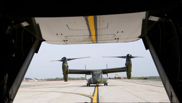 Uma aeronave Osprey do Corpo de Fuzileiros Navais dos EUA taxia perto de outro Osprey na base aérea de Andrews, Maryland, EUA. Foto de arquivo - Sputnik Brasil