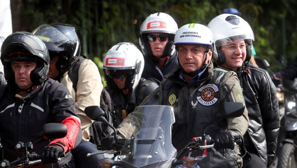 O presidente Jair Bolsonaro participa de ato em São Paulo sem usar máscara em meio à pandemia com mais de 484 mil vítimas do coronavírus, em São Paulo, em 12 de junho de 2021  - Sputnik Brasil