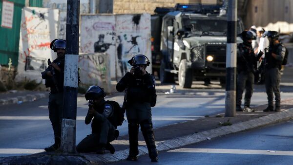 Policiais de fronteira israelenses durante protesto em Belém, na Cisjordânia ocupada por Israel, 15 de junho de 2021 - Sputnik Brasil