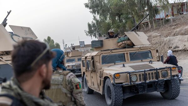 Forças Especiais Afegãs durante missão perto de posto de controle cercado pelo Talibã, na província de Kandahar, Afeganistão, 13 de julho de 2021 - Sputnik Brasil
