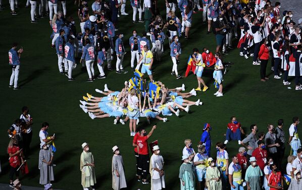 Atletas da seleção ucraniana na cerimônia de encerramento dos XXXII Jogos Olímpicos de Verão em Tóquio, no Estádio Olímpico Nacional - Sputnik Brasil