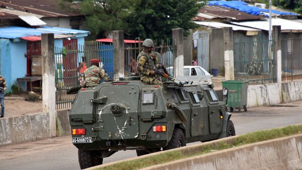 Members of the Armed Forces of Guinea drive through the central neighbourhood of Kaloum in Conakry on September 5, 2021 after sustainable gunfire was heard. - Sputnik Brasil