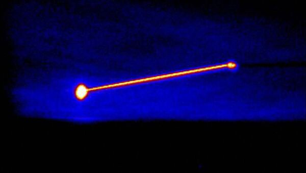 Imagem em infravermelho do Laser Aerotransportado de Teste da Agência de Defesa de Mísseis dos EUA, destruindo um míssil balístico de curto alcance (E). Foto de arquivo - Sputnik Brasil