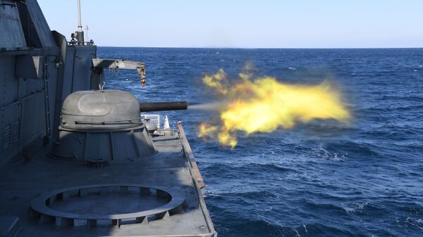 Disparo do sistema automático de artilharia AO-18 (AK-630) da corveta Gromky no âmbito dos exercícios anuais Cooperação Marítima 2021 no mar do Japão - Sputnik Brasil
