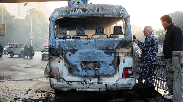 Ônibus atingido pelas explosões de bomba em Damasco, Síria, 20 de outubro de 2021 - Sputnik Brasil