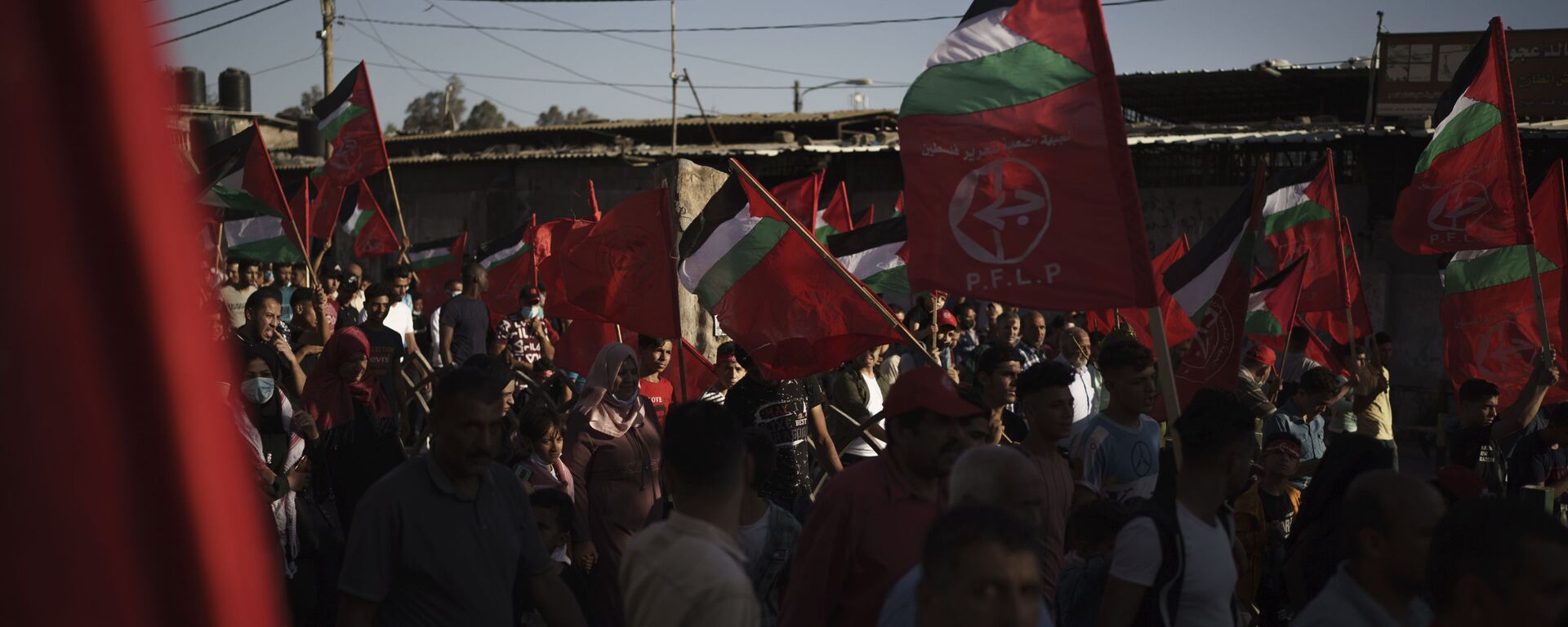 Palestinos participam de ato organizado pela Frente Popular para a Libertação da Palestina (PLFP, na sigla em inglês), na cidade de Gaza, 2 de junho de 2021 - Sputnik Brasil, 1920, 23.10.2021