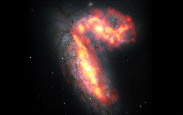 NGC 4567 e NGC 4568 – duas galáxias em processo de colisão no aglomerado de Virgem a 65 milhões de anos-luz da Terra. - Sputnik Brasil