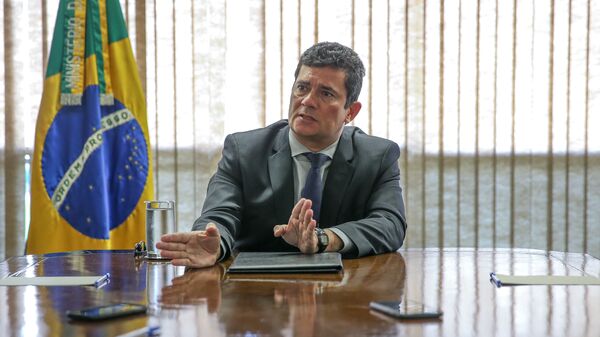 O ministro da Justiça, Sergio Moro, durante entrevista exclusiva à Folha em seu gabinete em Brasília em 19 de março de 2020 - Sputnik Brasil