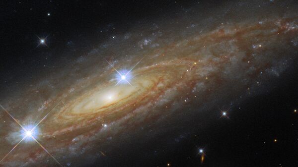 Imagem da galáxia espiral UGC 11537 tirada pelo telescópio espacial Hubble 

 - Sputnik Brasil