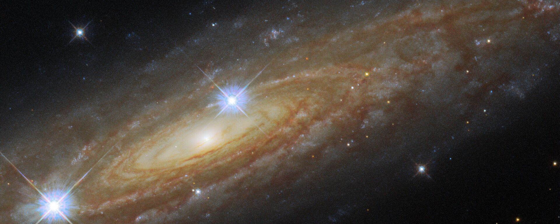 Imagem da galáxia espiral UGC 11537 tirada pelo telescópio espacial Hubble 

 - Sputnik Brasil, 1920, 21.02.2022
