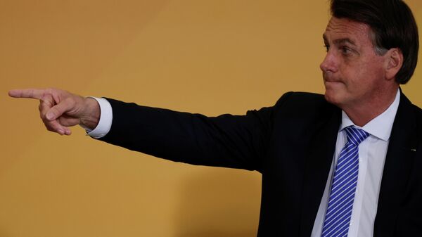 O presidente do Brasil Jair Bolsonaro gesticula durante o lançamento do programa Brasil Fraterno, no Palácio do Planalto em Brasília, Brasil, 11 de novembro de 2021 - Sputnik Brasil