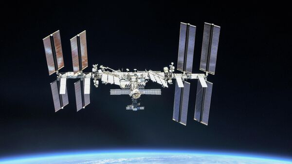 Estação Espacial Internacional sobre a Terra (foto de arquivo) - Sputnik Brasil