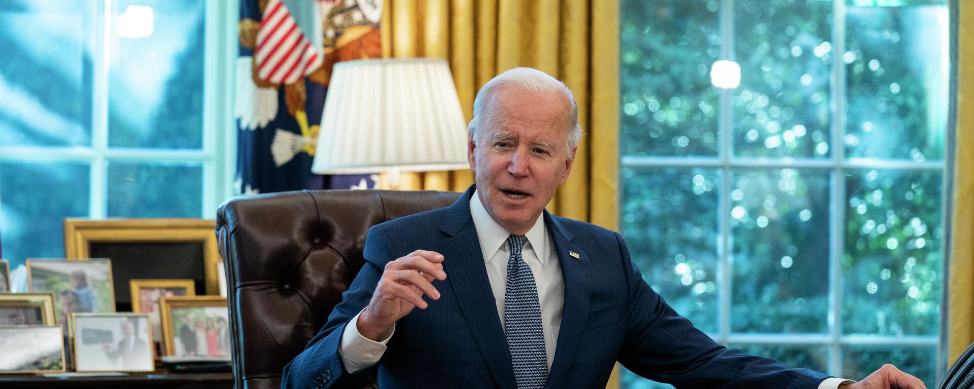 O presidente dos EUA, Joe Biden, fala antes de assinar uma ordem executiva, no Salão Oval da Casa Branca, no dia 13 de dezembro de 2021, em Washington - Sputnik Brasil, 1920, 11.01.2022